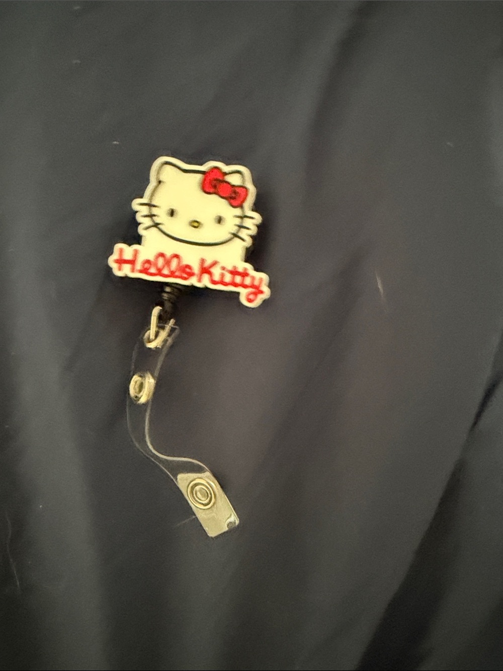 Hello Kitty White & Red Badge Reel Card Holder
